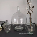 clear large round glass bottle vases